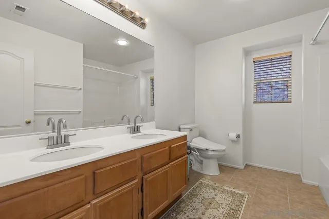 a view of a park with palm trees