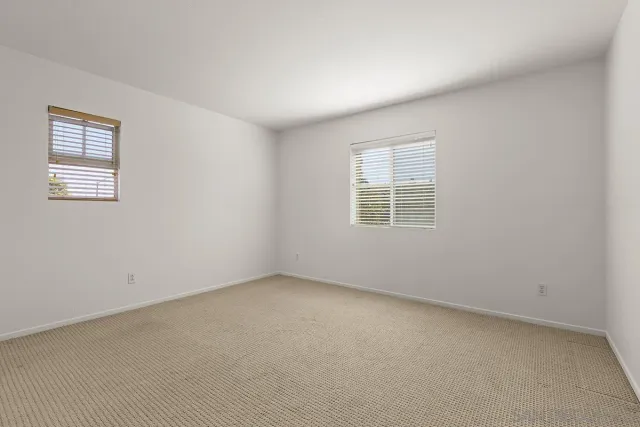 a view of multiple houses with a yard