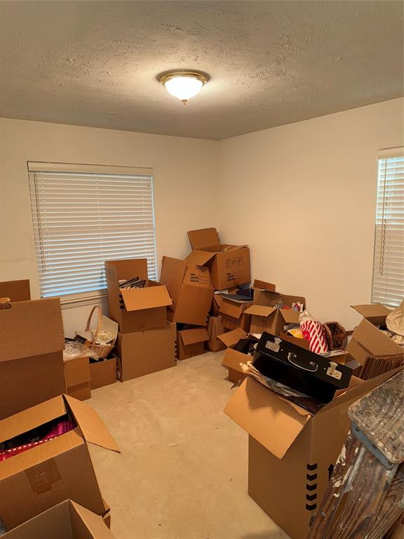 12039 Schroeder Road Dallas, TX 75243 - Photo 13 of 29 a room with furniture