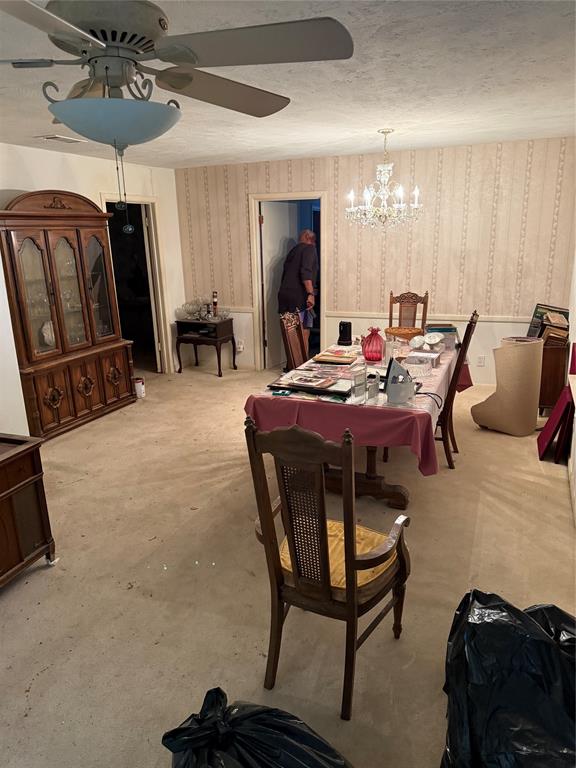 12039 Schroeder Road Dallas, TX 75243 - Photo 4 of 29 a dining room with furniture and window