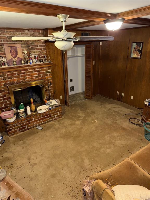12039 Schroeder Road Dallas, TX 75243 - Photo 10 of 29 a view of a livingroom with a fireplace and window
