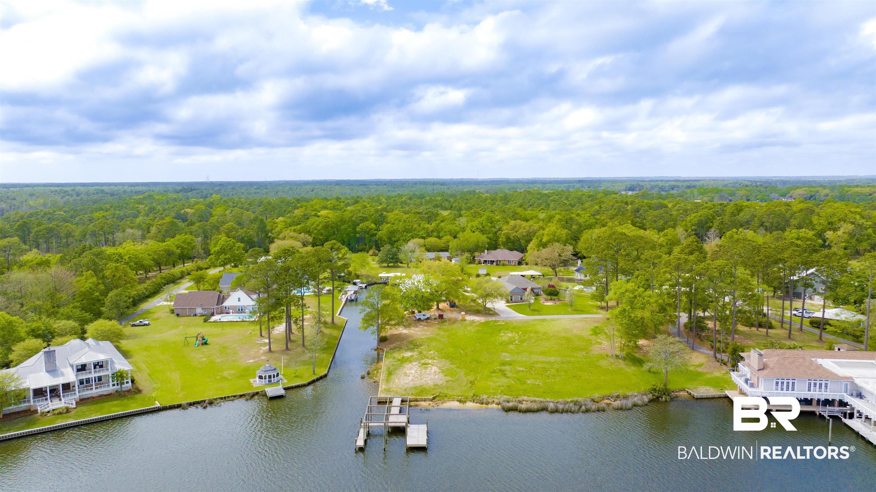 0 South Windsor Road South Theodore, AL 36582 - Photo 3 of 22 Bird's eye view of a heavily wooded area and a large body of water
