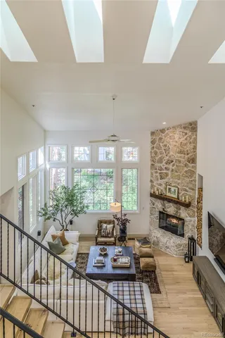a living room with furniture fireplace and a flat screen tv