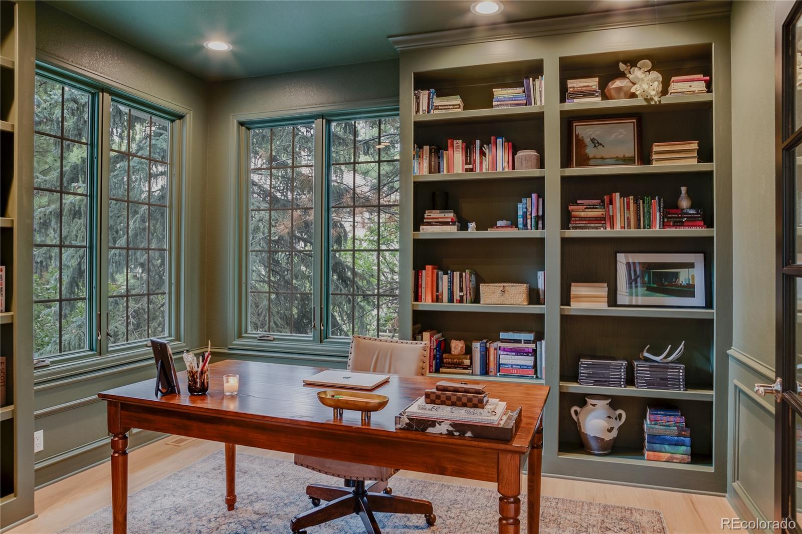 475 Silbrico Way Castle Rock, CO 80108 - Photo 21 of 50 a view of a workspace with bookshelf