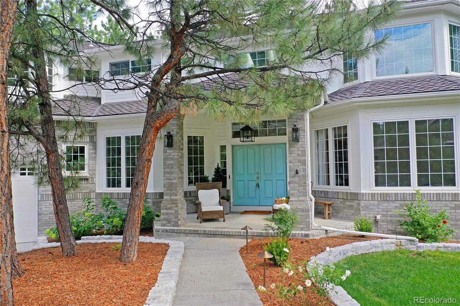 475 Silbrico Way Castle Rock, CO 80108 - Photo 3 of 50 a front view of a house with garden
