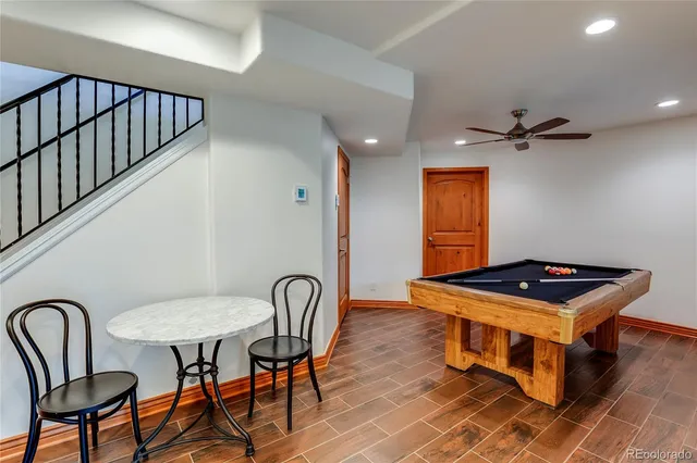 a kitchen with stainless steel appliances a stove microwave and refrigerator