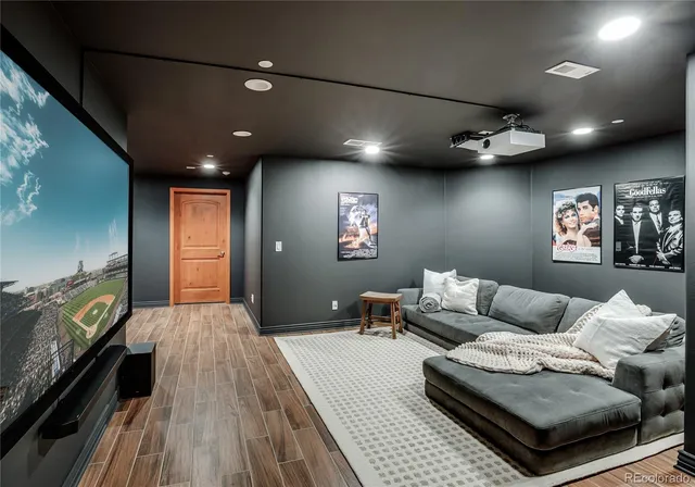 a room with furniture and a flat screen tv