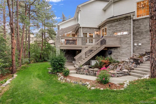 a view of yard with patio