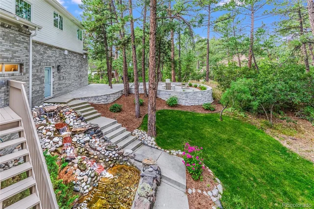 a view of a patio with swimming pool