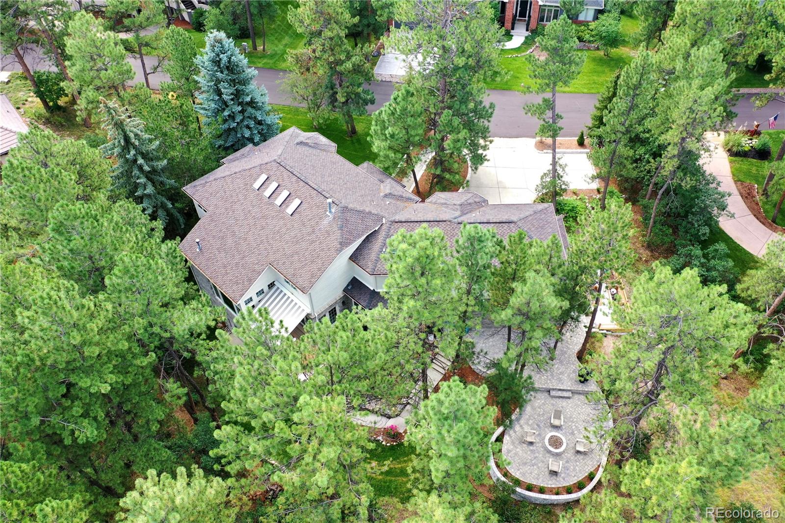 475 Silbrico Way Castle Rock, CO 80108 - Photo 48 of 50 an aerial view of a house with garden space and street view