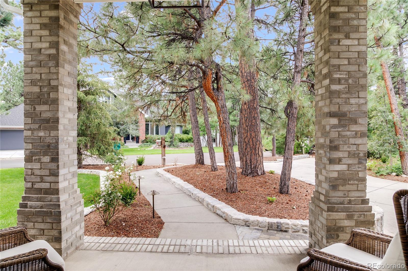 475 Silbrico Way Castle Rock, CO 80108 - Photo 5 of 50 a view of a backyard with a garden