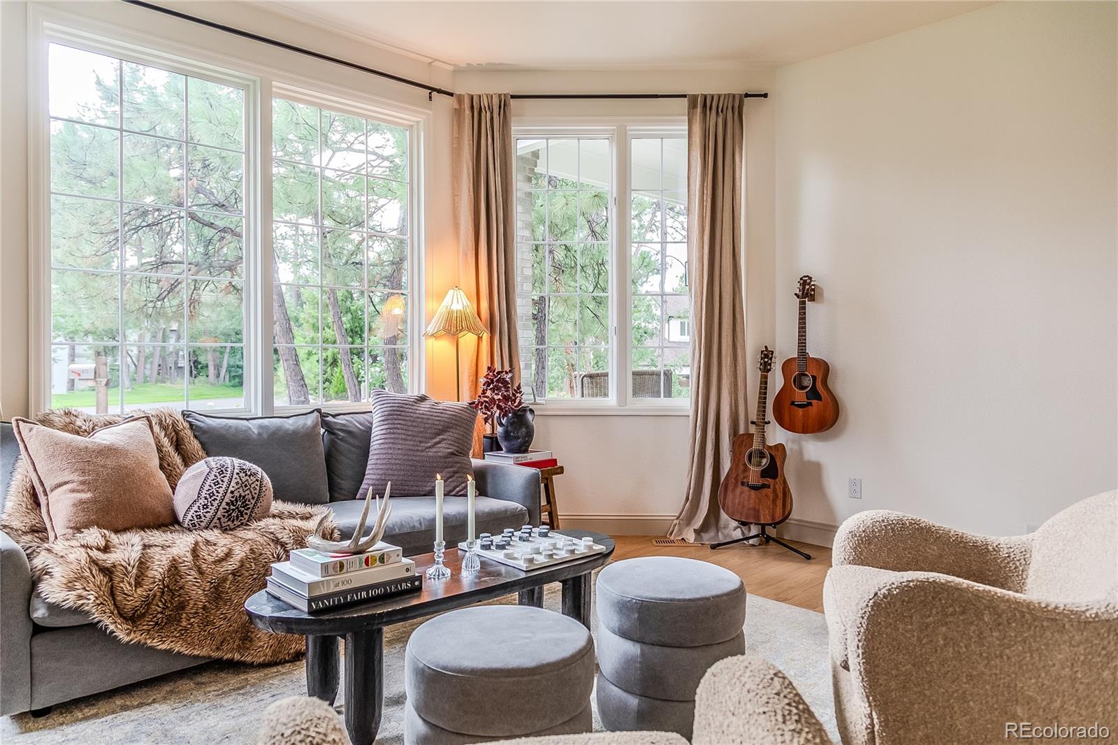 475 Silbrico Way Castle Rock, CO 80108 - Photo 10 of 50 a living room with furniture and a window