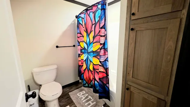 a bathroom with a sink a mirror and a vanity