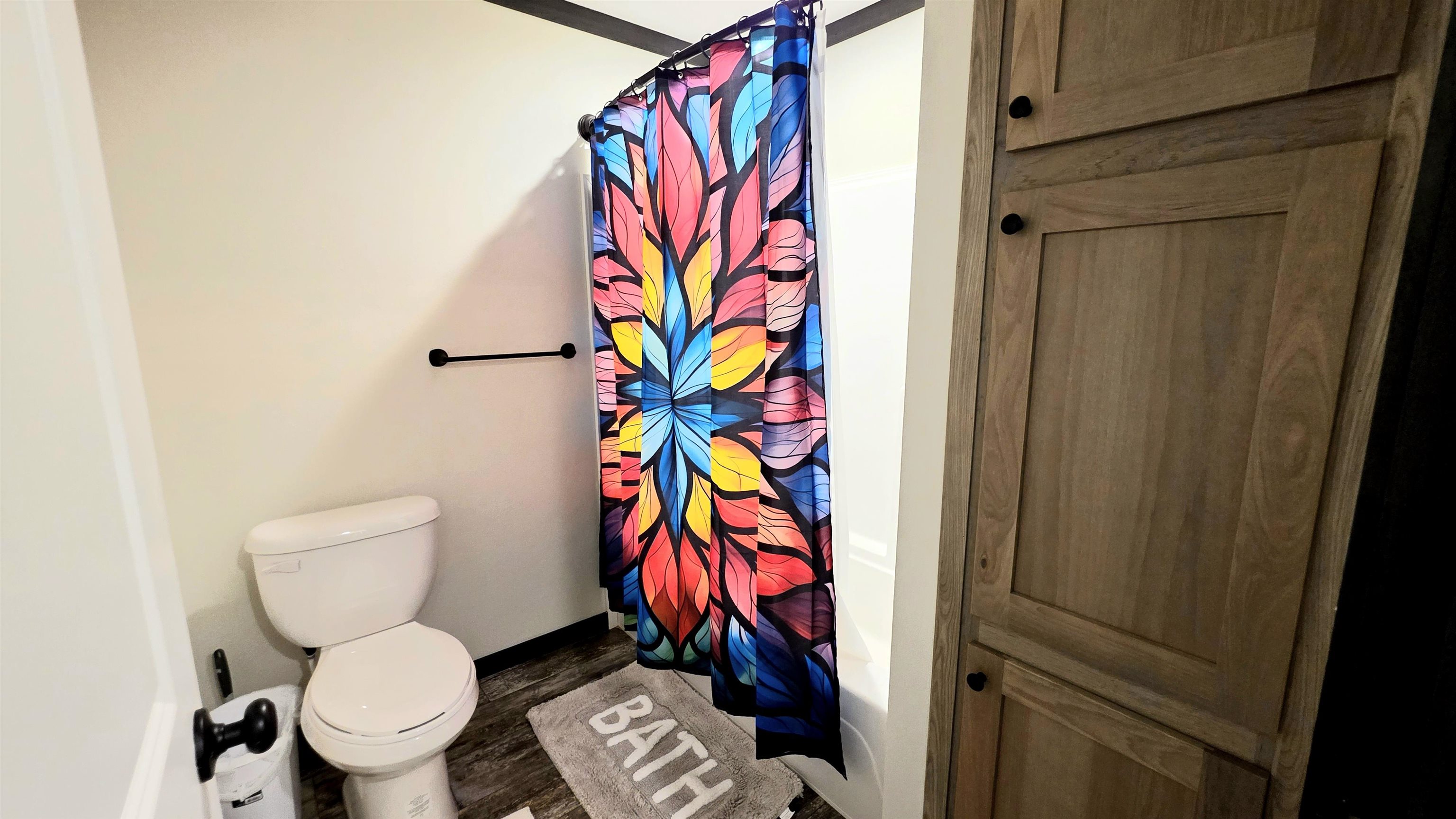 350 George Lane Michie, TN 38357 - Photo 12 of 19 a bathroom with a toilet and a shower curtain