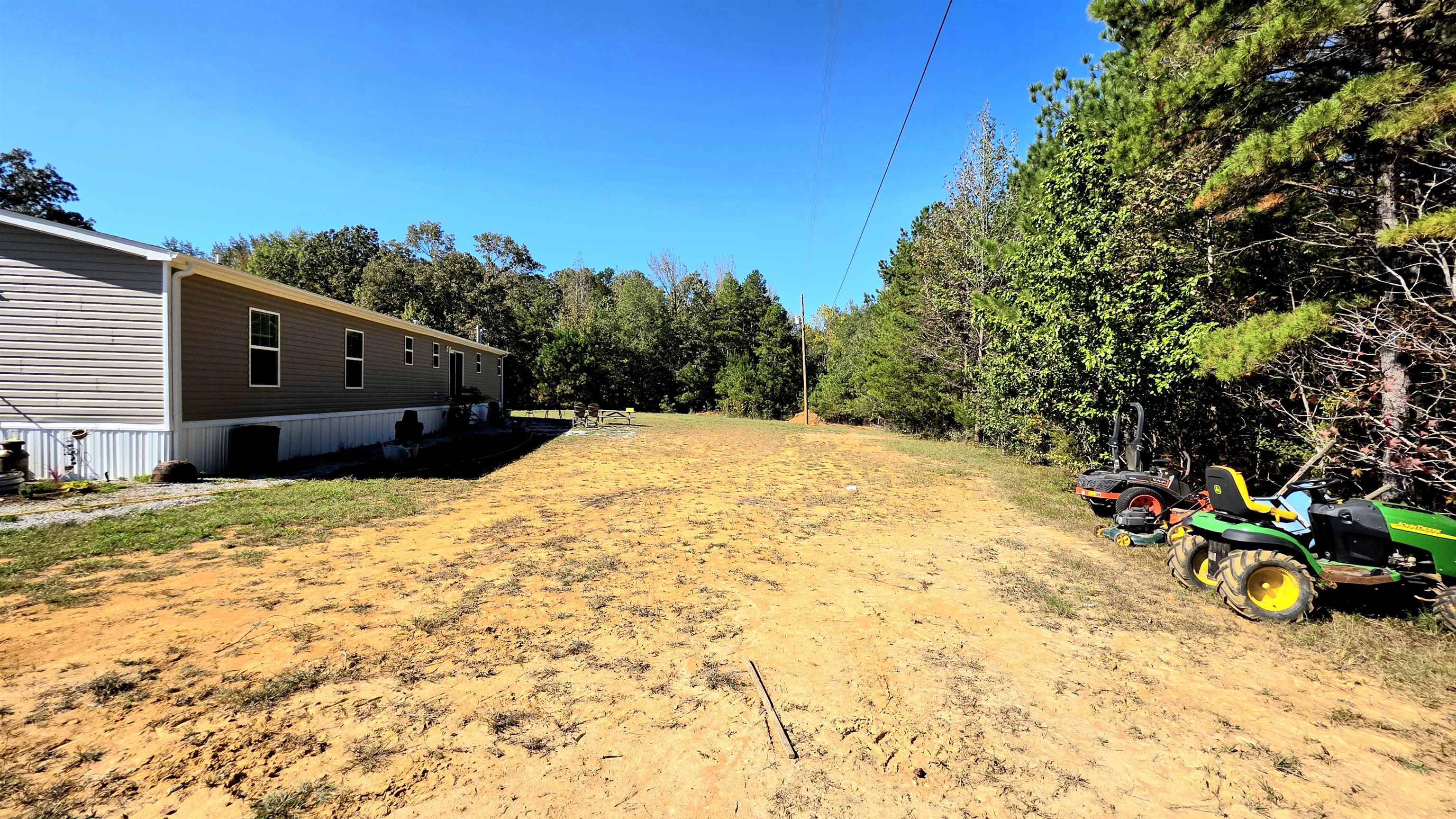 350 George Lane Michie, TN 38357 - Photo 17 of 19 a view of a backyard with a large tree
