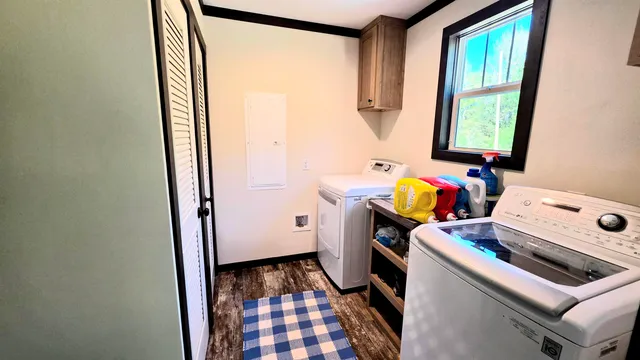 a room with table and bed