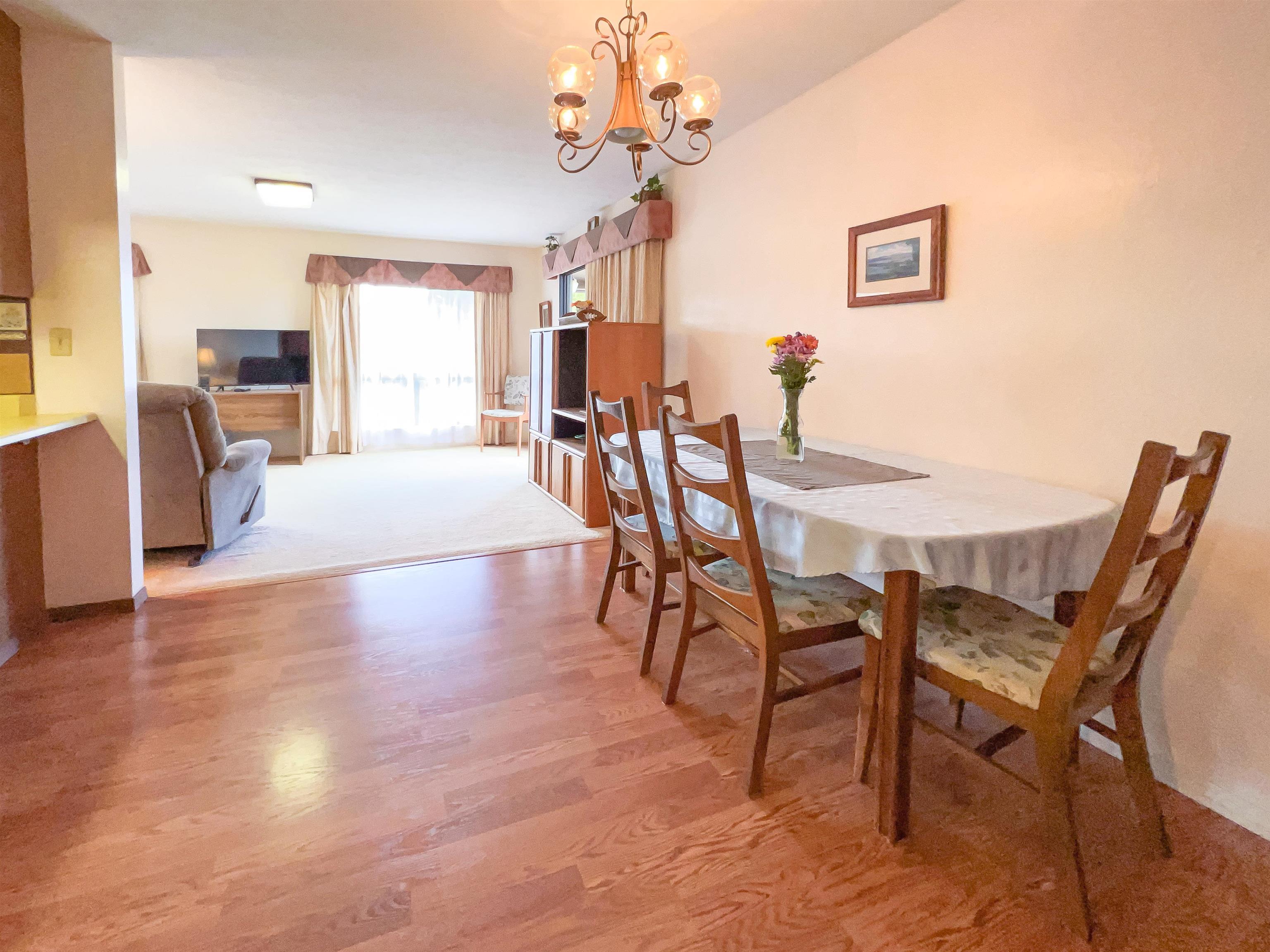 76 Mano Drive Kula, HI 96790 - Photo 11 of 30 a view of a dining room with furniture and a chandelier