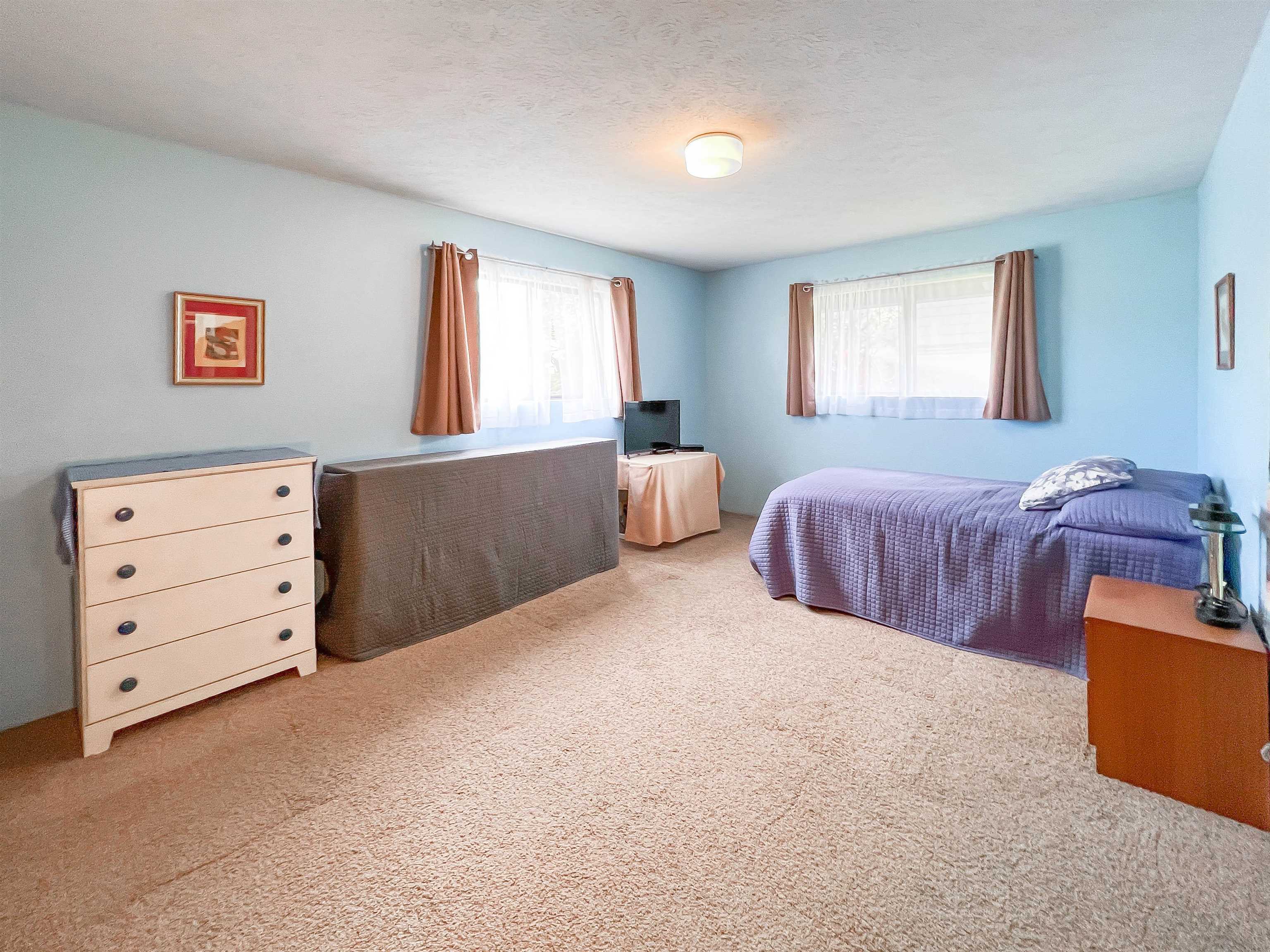 76 Mano Drive Kula, HI 96790 - Photo 17 of 30 a bedroom with bed and window