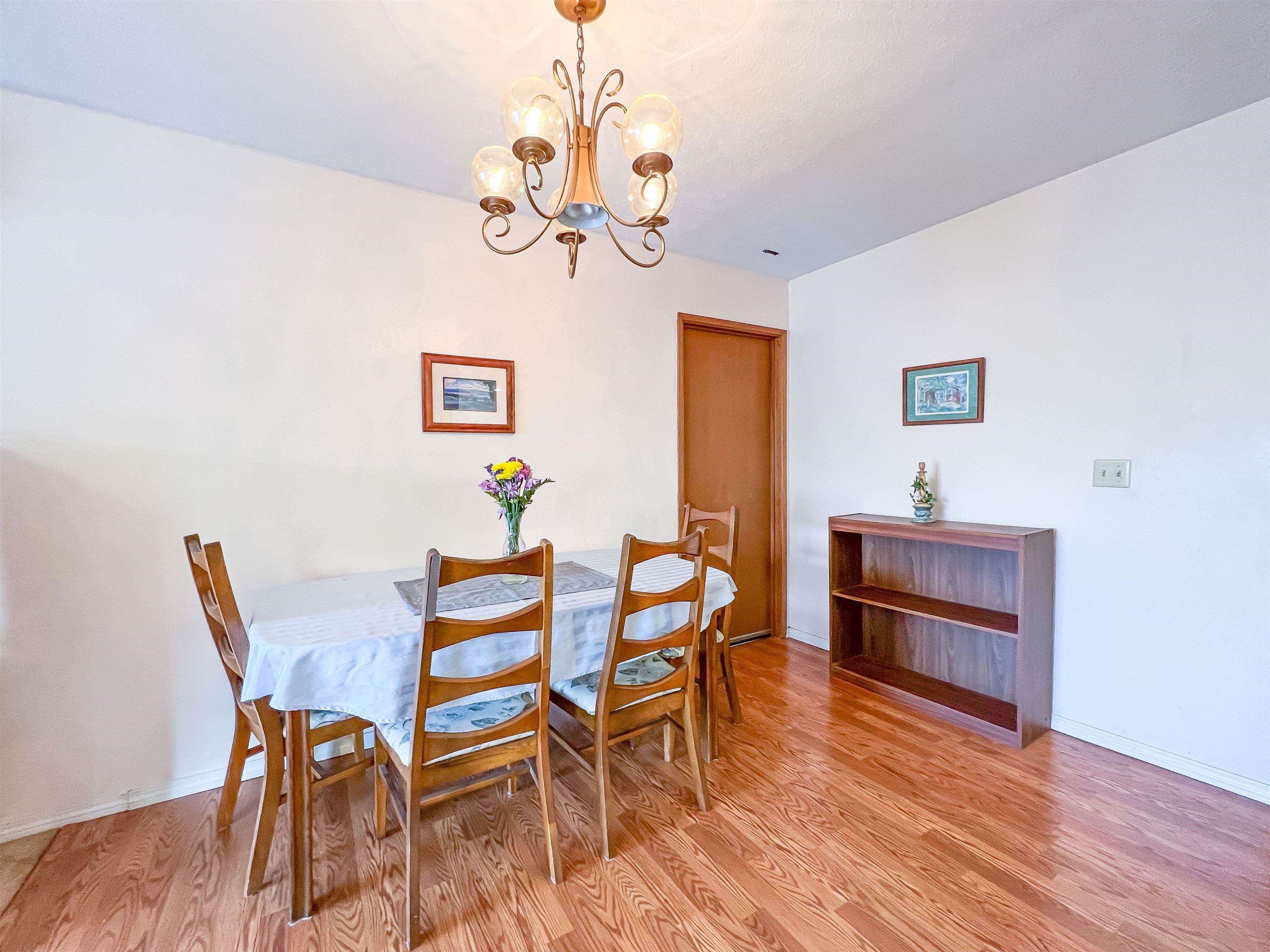 76 Mano Drive Kula, HI 96790 - Photo 25 of 30 a view of a dining room with furniture and wooden floor