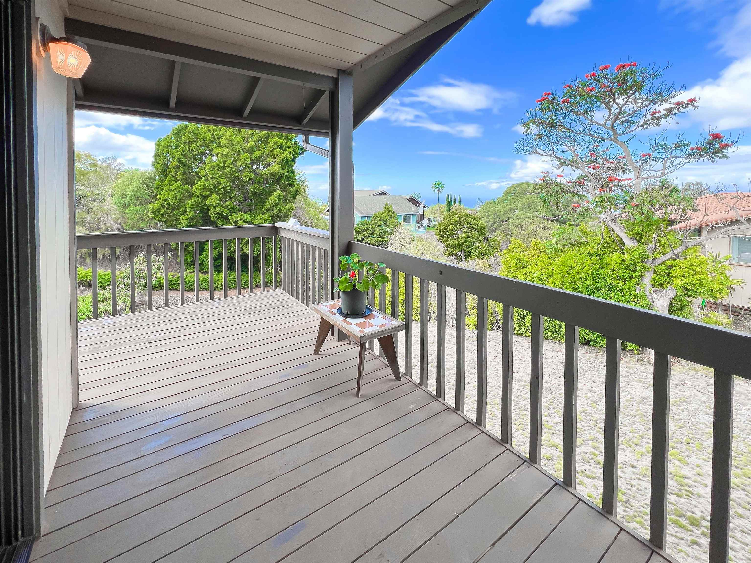 76 Mano Drive Kula, HI 96790 - Photo 7 of 30 a view of balcony with wooden floor
