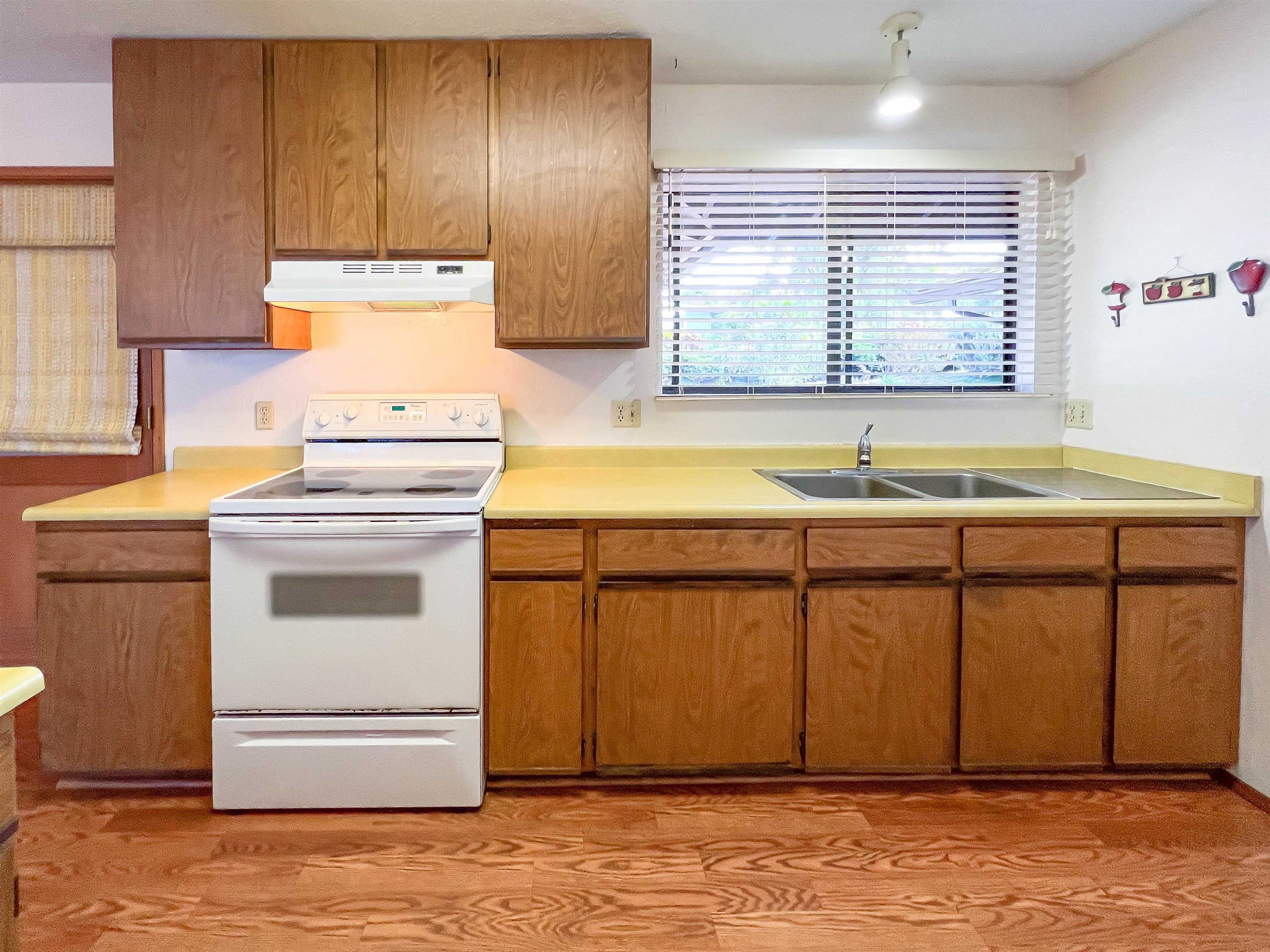 76 Mano Drive Kula, HI 96790 - Photo 9 of 30 a kitchen with granite countertop a sink and a stove