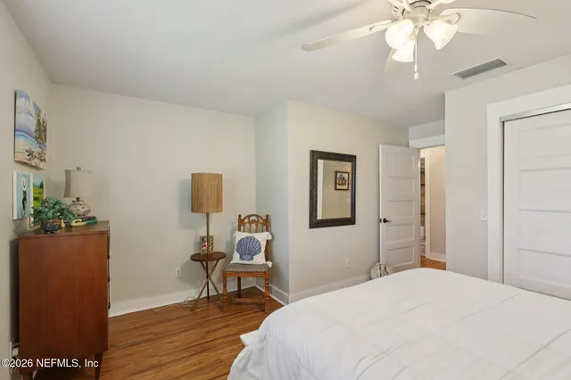 a view of backyard with sitting area