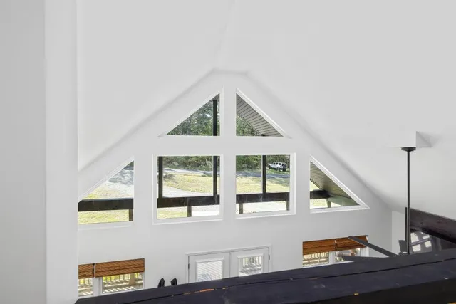 a view of a bathroom with a sink and a window