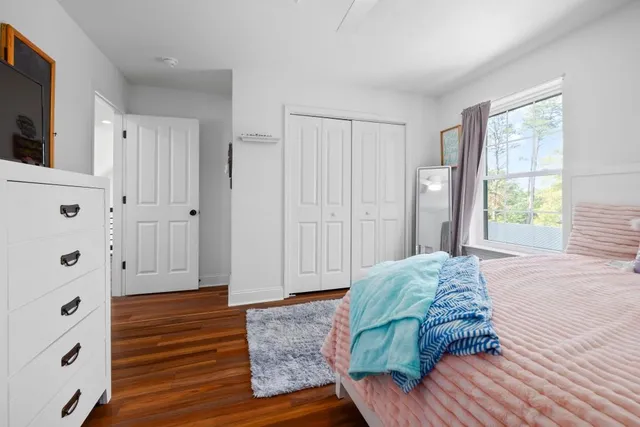 a bathroom with a sink mirror toilet and shower