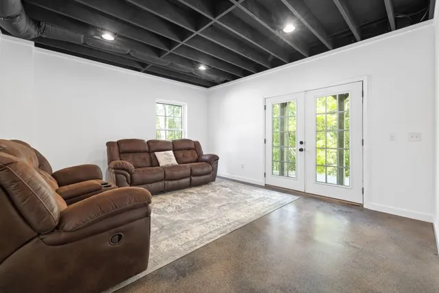 a view of a garage with parked cars