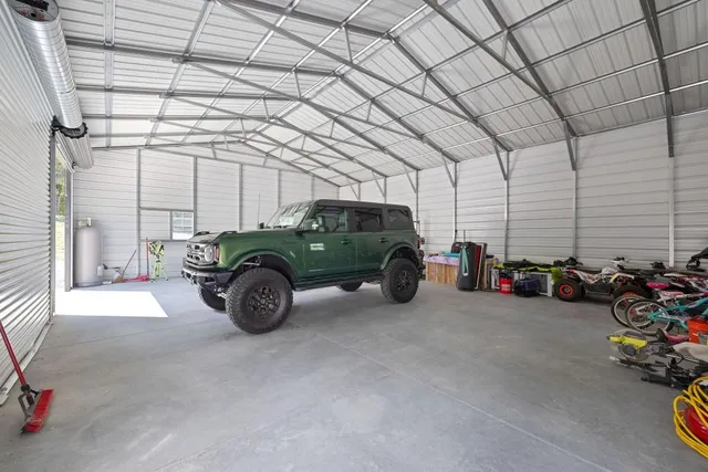 a pathway of a house with a yard