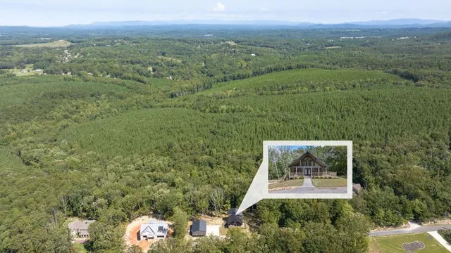 a view of a lake with a yard