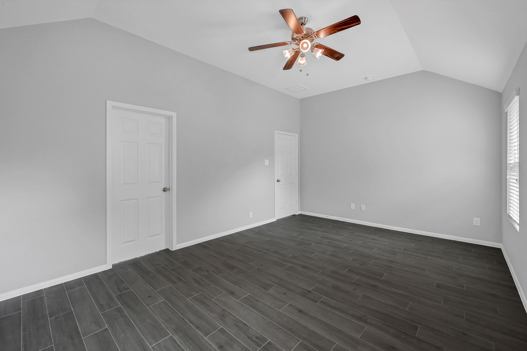 20039 Sunshine Ridge Lane Cypress, TX 77429 - Photo 15 of 22 High Ceiling with ceiling fan in the primary Bedroom