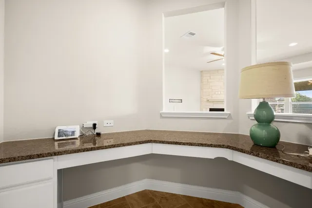 a kitchen with a sink and a window