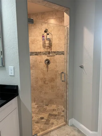 a bathroom with a bathtub and a sink