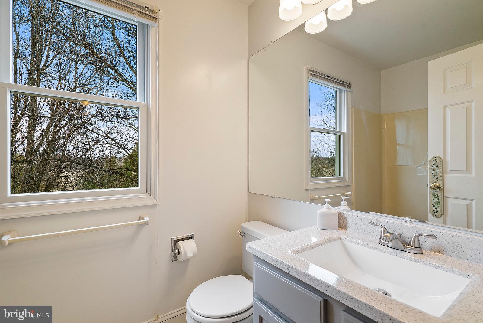 8747 Meetze Road Warrenton, VA 20187 - Photo 15 of 38 hall bath has new vanity top and lighting