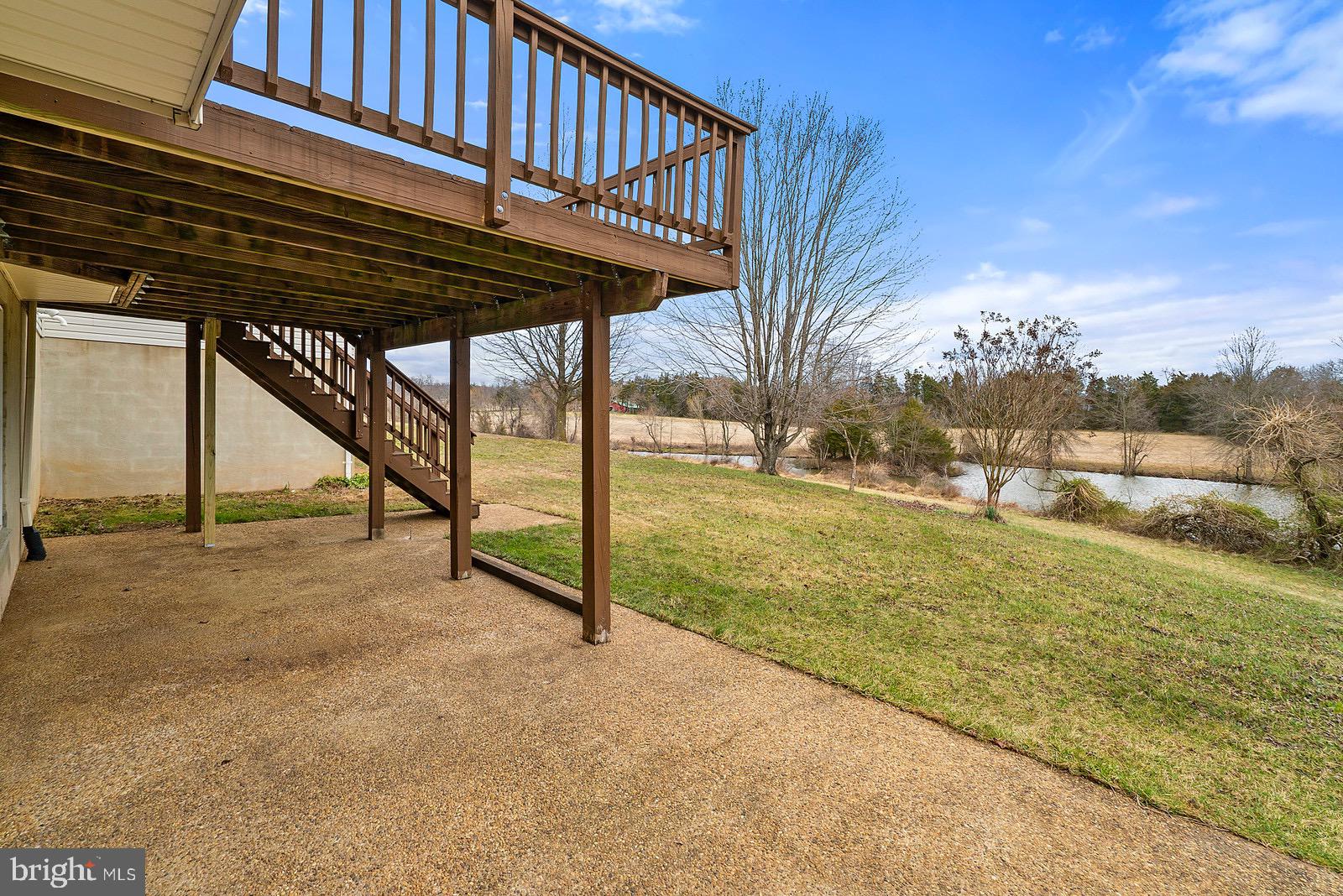 8747 Meetze Road Warrenton, VA 20187 - Photo 34 of 38 concrete patio under deck
