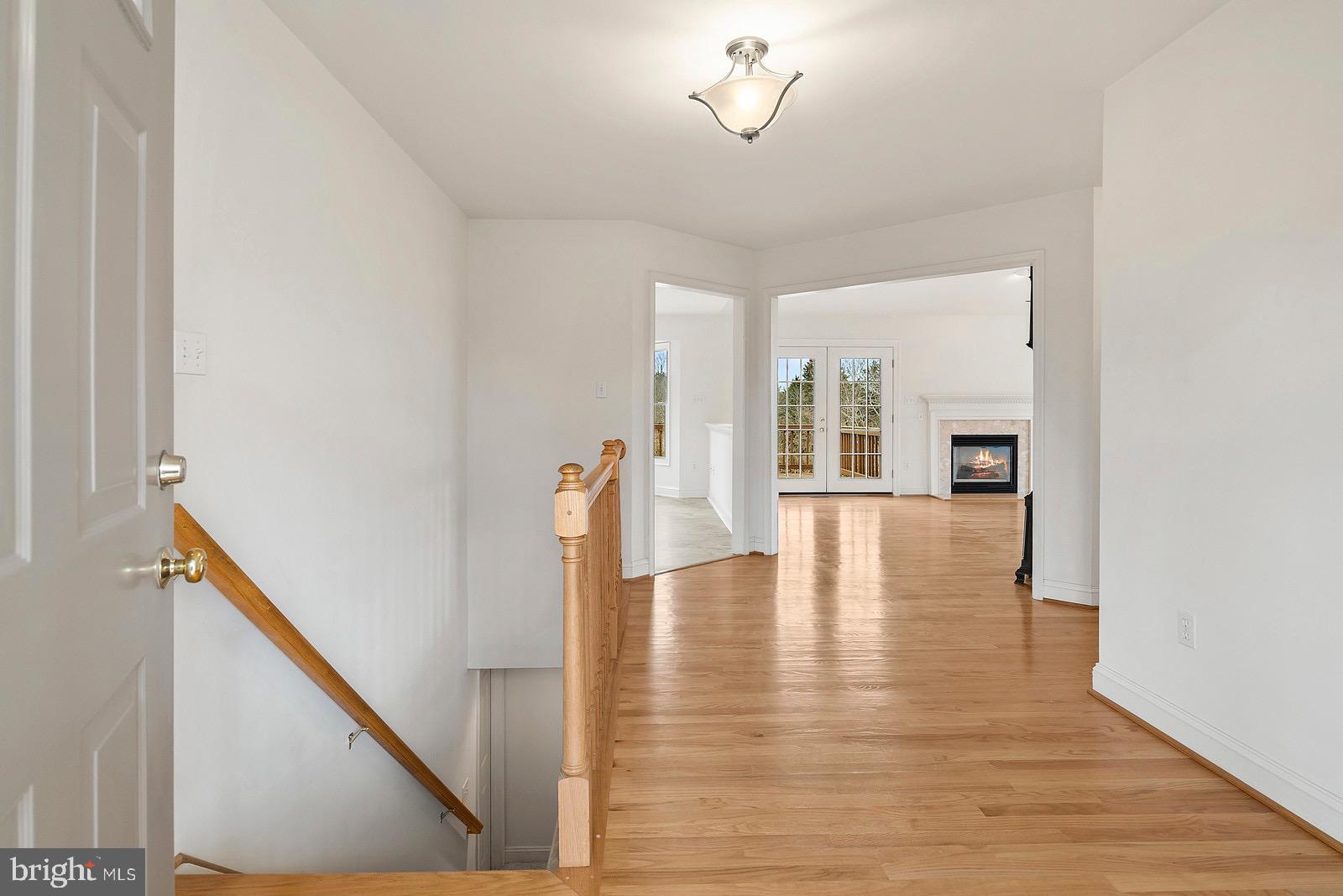 8747 Meetze Road Warrenton, VA 20187 - Photo 8 of 38 Hardwood floors in foyer, hall, dining and family
