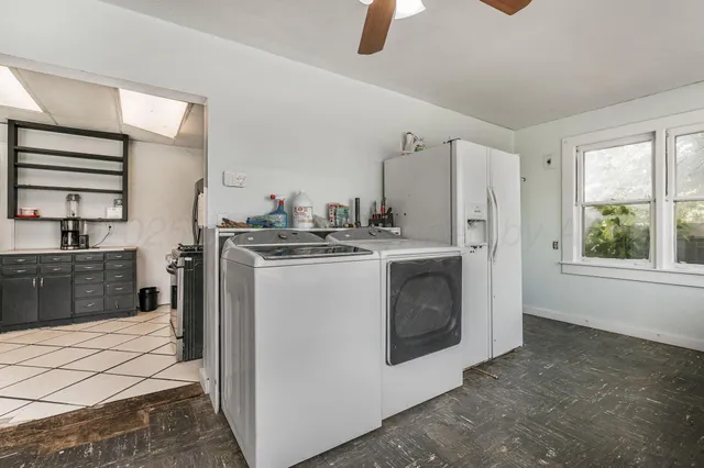 a utility room with dryer and washer