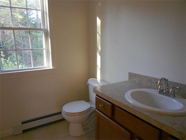 7 Box Turtle Drive Rochester, MA 02770 - Photo 8 of 16 a bathroom with a granite countertop toilet sink and mirror