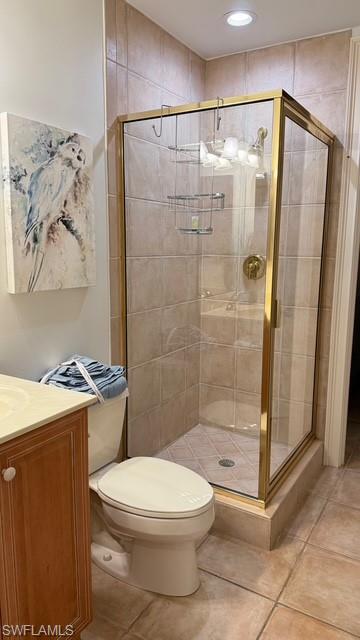 391 4th Street South, Unit 401 Naples, FL 34102 - Photo 29 of 31 a bathroom with a toilet and a shower