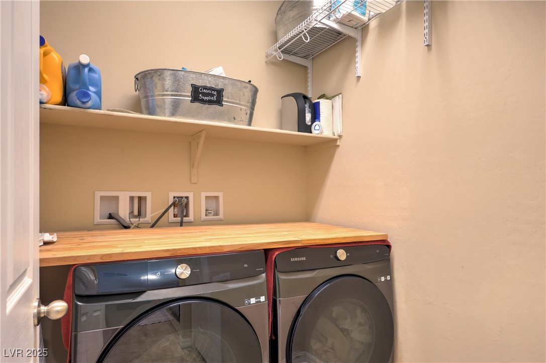 2373 Rue Royale Street Henderson, NV 89044 - Photo 14 of 29 Laundry room featuring separate washer and dryer.