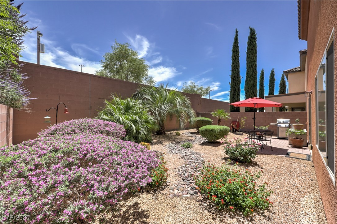 2373 Rue Royale Street Henderson, NV 89044 - Photo 27 of 29 Fenced backyard featuring a patio area