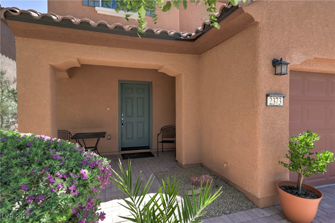 2373 Rue Royale Street Henderson, NV 89044 - Photo 4 of 29 Entrance to property featuring stucco siding