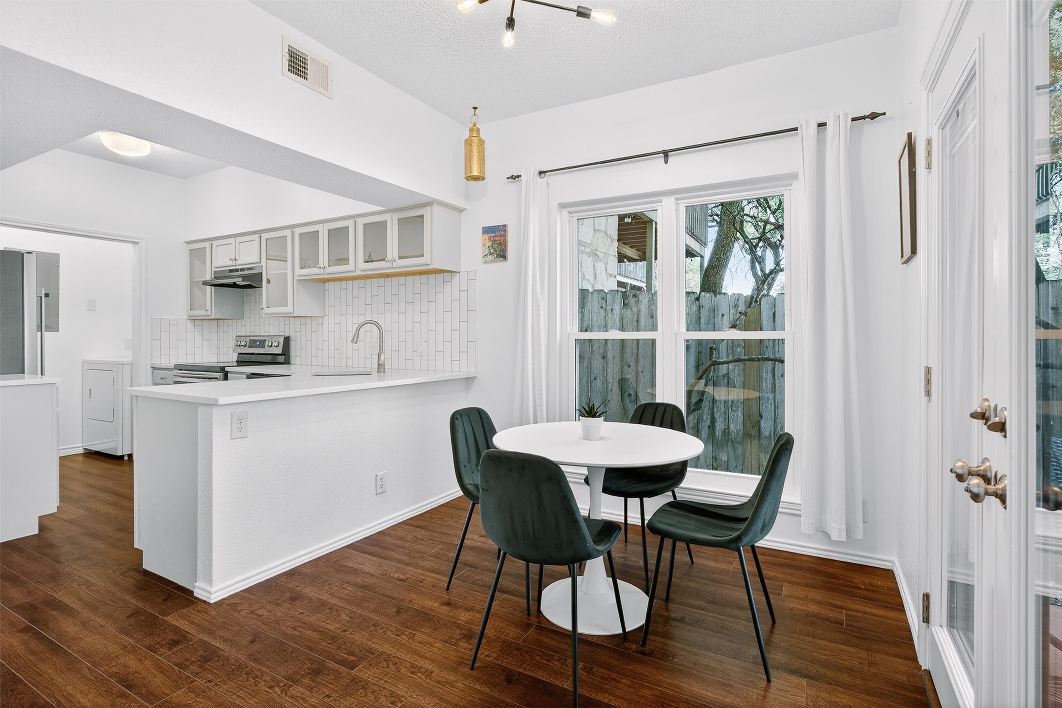 3809 Spicewood Springs Road, Unit 103 Austin, TX 78759 - Photo 9 of 39 Modern light fixtures.