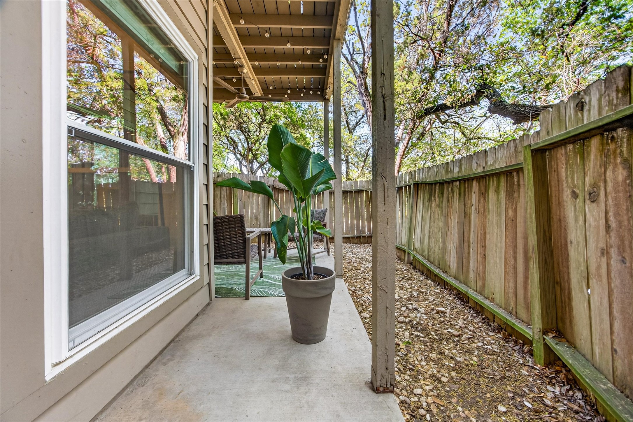 3809 Spicewood Springs Road, Unit 103 Austin, TX 78759 - Photo 30 of 39 Fenced backyard featuring a patio