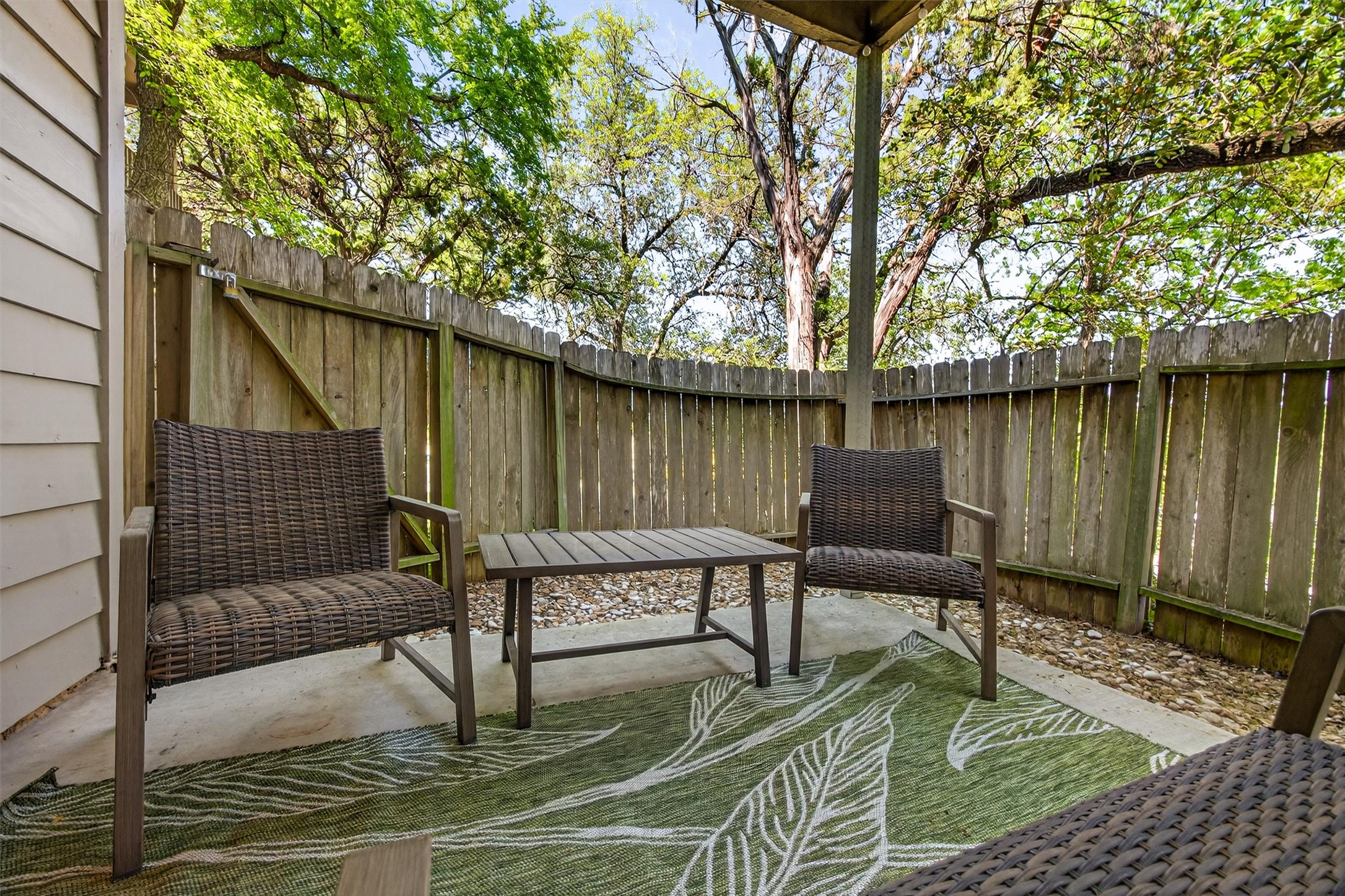 3809 Spicewood Springs Road, Unit 103 Austin, TX 78759 - Photo 32 of 39 Fenced backyard with a patio