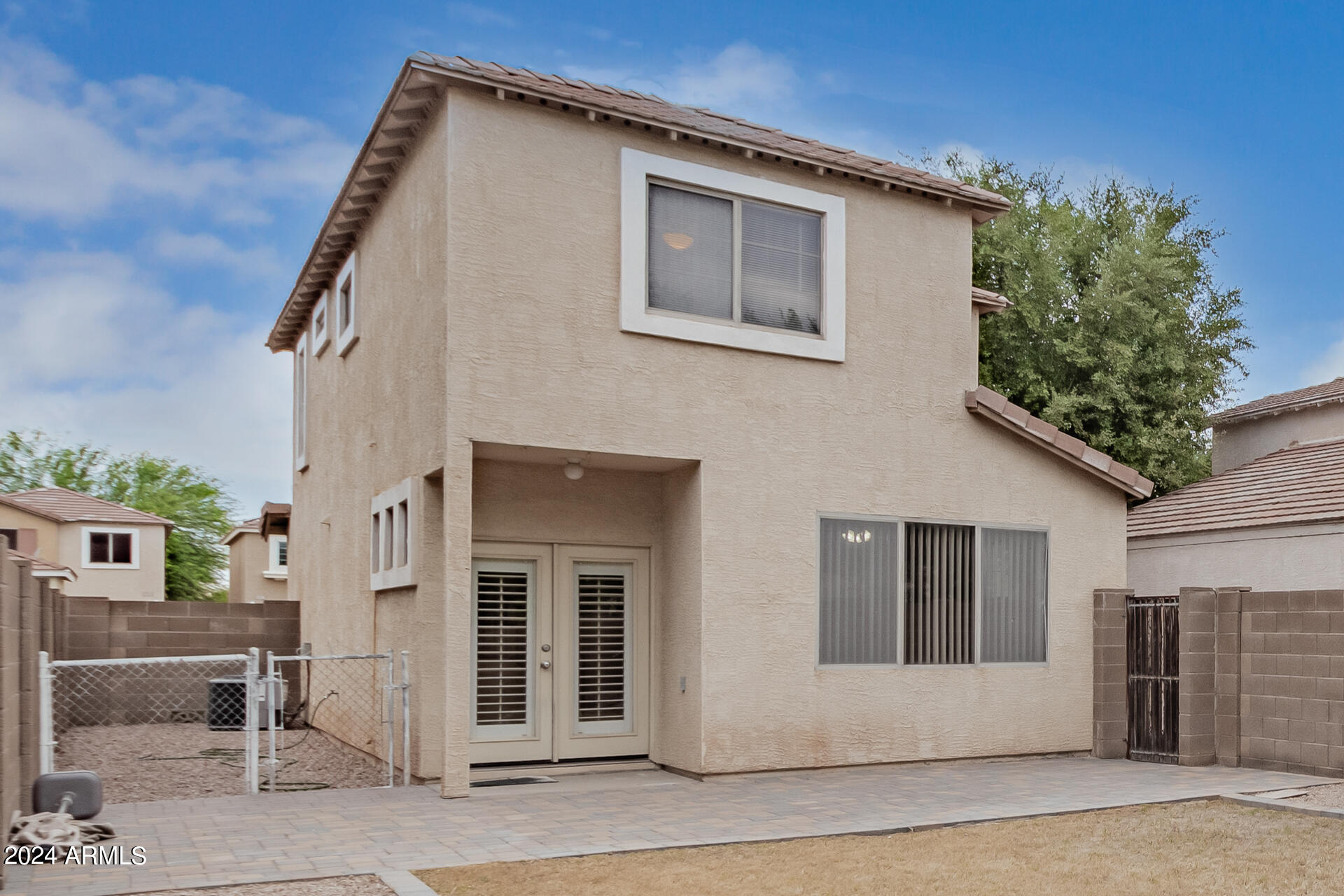 1371 South Boulder Street, Unit A Gilbert, AZ 85296 - Photo 37 of 43 a view of a house with a garage