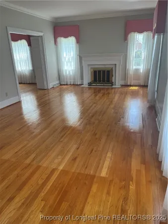 wooden floor in a hall with an entryway