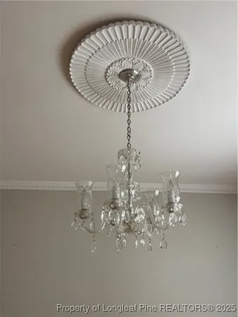 a view of a chandelier in a room