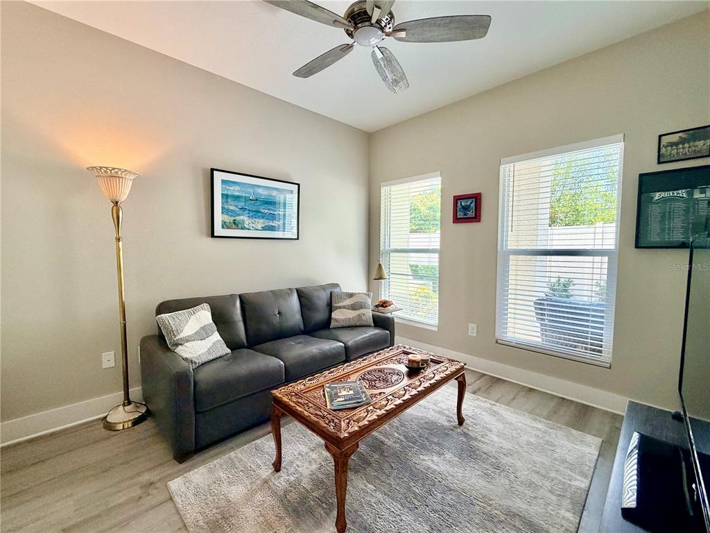 946 Highland Avenue Dunedin, FL 34698 - Photo 12 of 45 a living room with furniture and a window